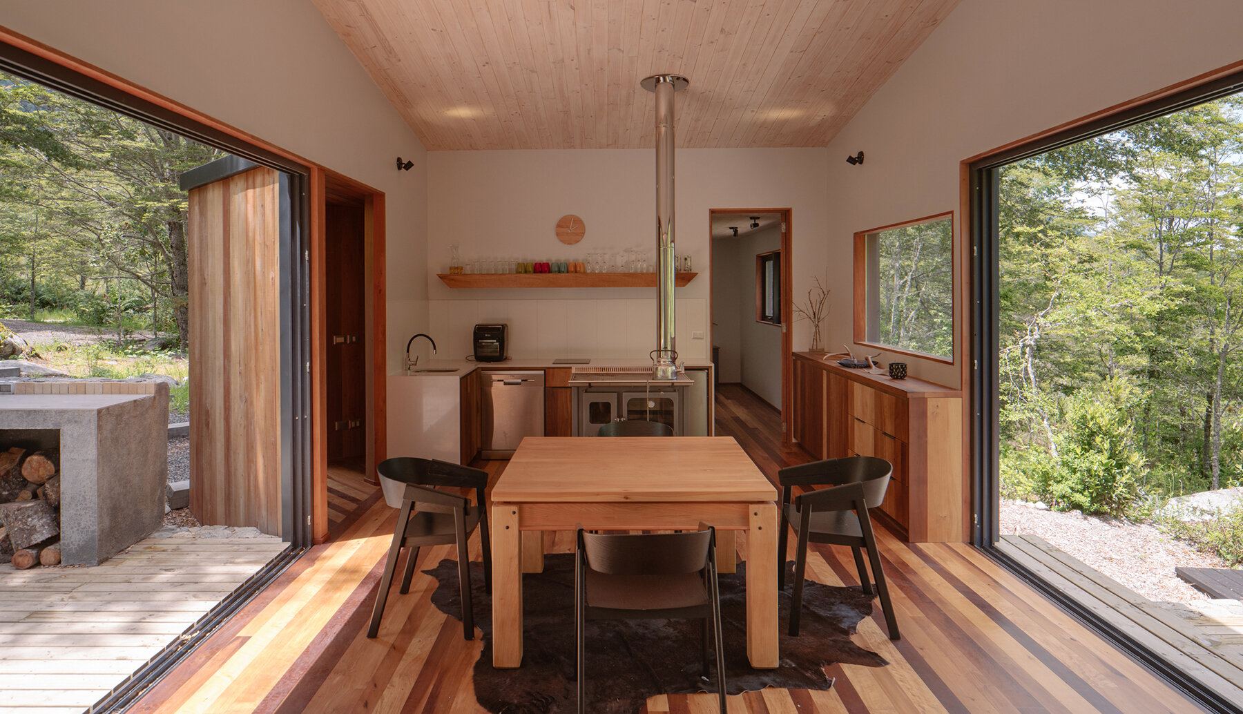 minimalistic-cabin-hebra-arquitecto-stone-plinth-chile-designboom-1800