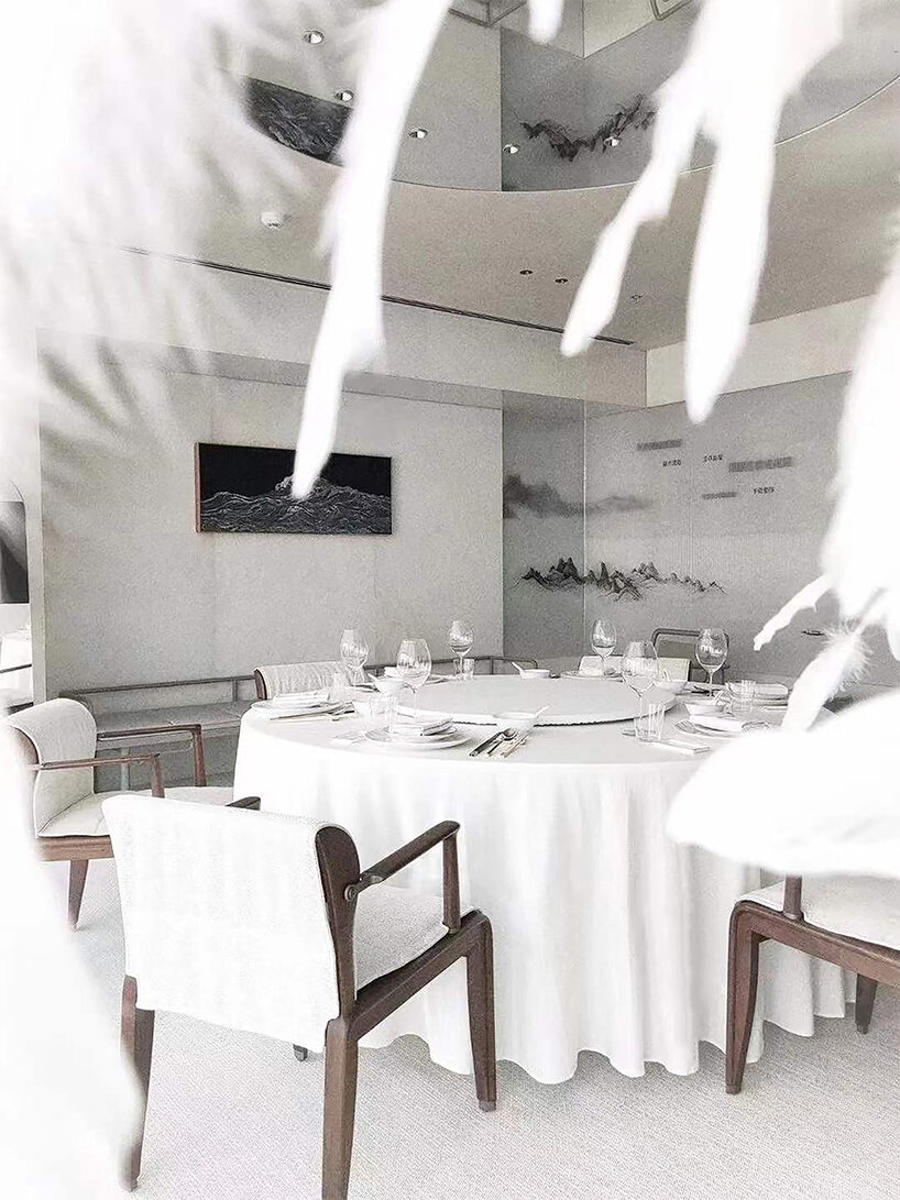 uniquely themed dining rooms shape this upscale restaurant in hangzhou, china