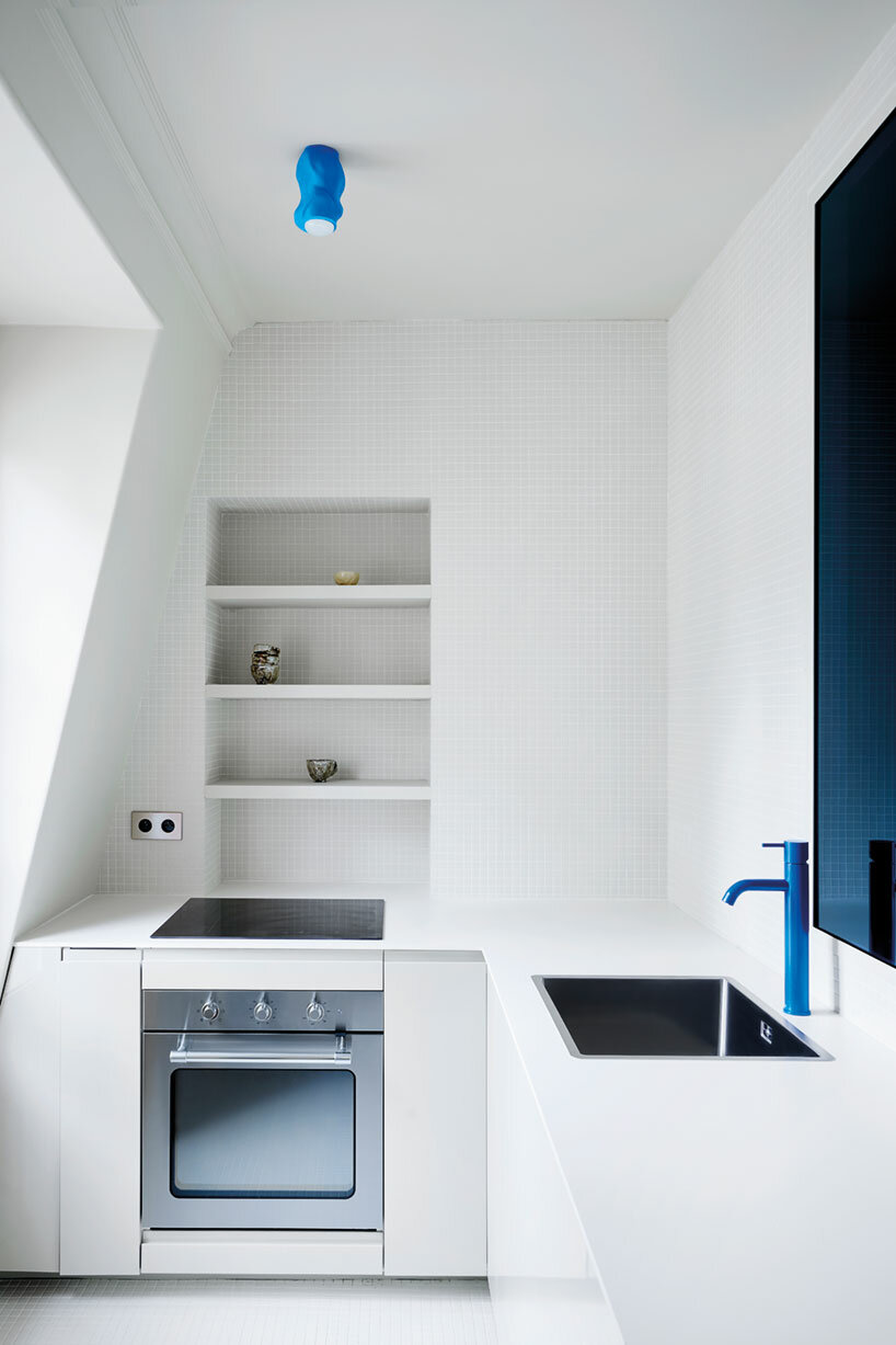 zyva studio's 'straight curves' apartment brings vibrant digital patterns to paris