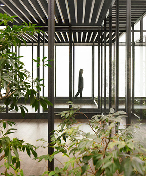 nendo designs plant-filled communication lounge for japanese homebuilder company in osaka
