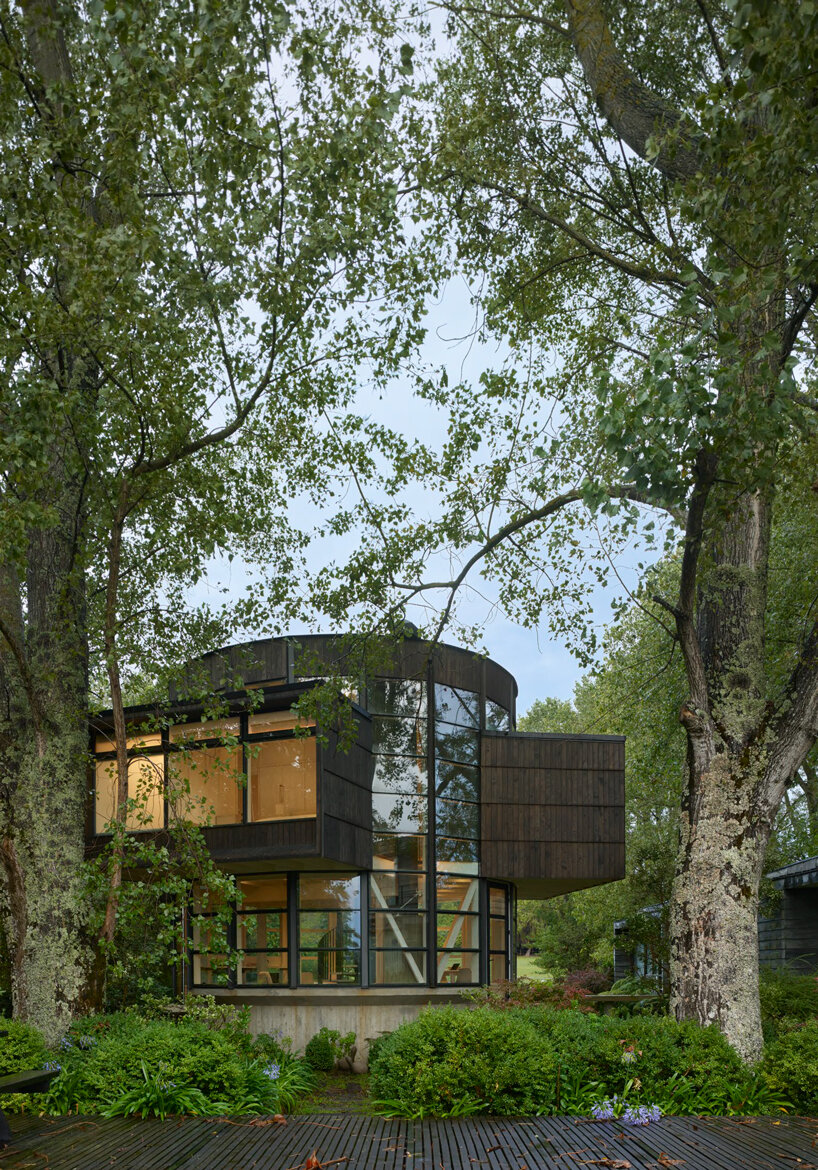 this cylindrical guest house in chile features pop-out bedroom boxes