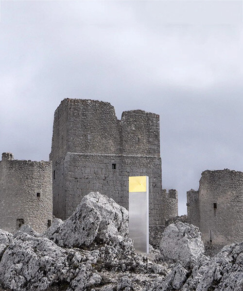kinetic mirror totem by edoardo dionea cicconi distorts medieval fort surroundings in italy