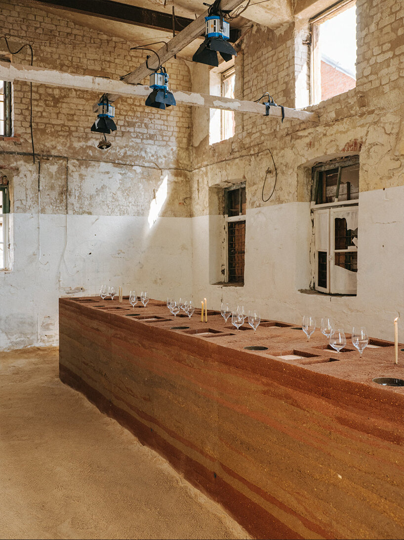 kuidas.works builds rammed earth dining table within seven days 