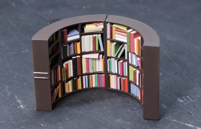 empty food can becomes portal to cozy, miniature reading room