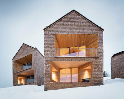 twelve chalets scattered over the austrian alps become the peterhof alpe furx hotel