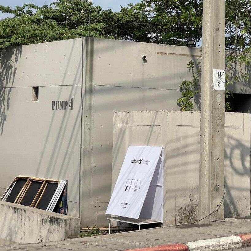 stray dogs in thailand find shelter in folding structures made from repurposed billboards