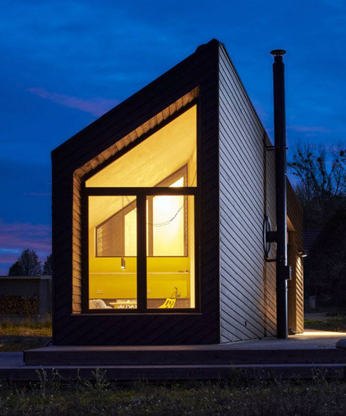rhombic-shaped 'house wustrow' near berlin redefines boathouse and barn typology