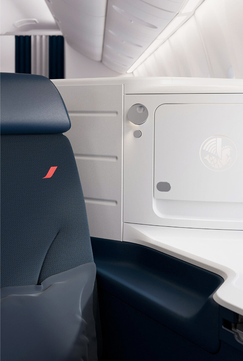 air france unveils new business seats with enveloping curves and sliding doors