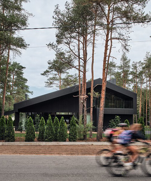 AZIA arhitektid nestles 'a house for a family and bikes' into pine forest outside of tallinn