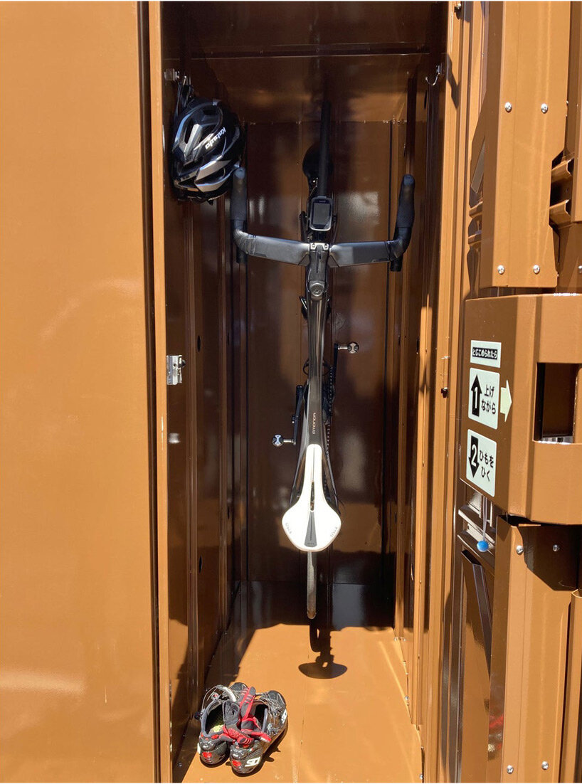 vertical bike parking lockers emerge in japan to give cyclists peace of mind