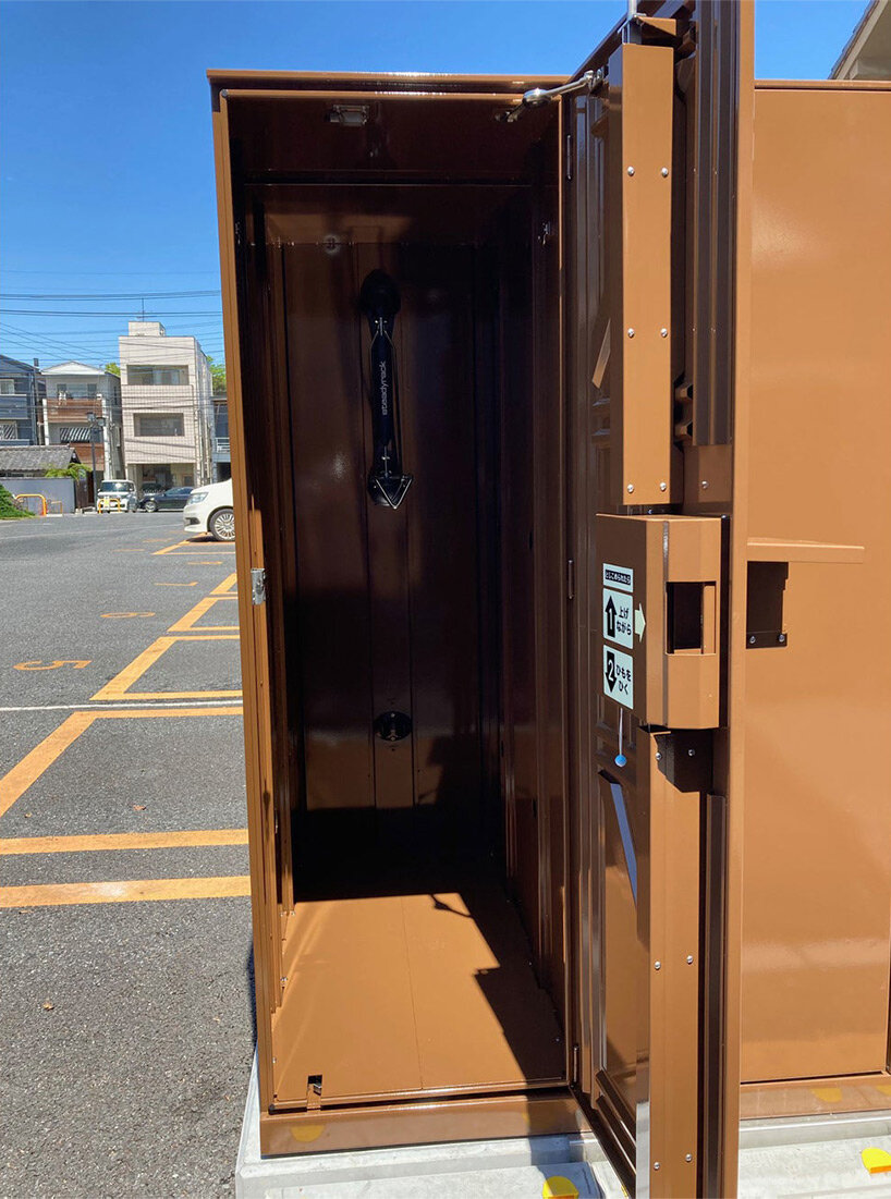 vertical bike parking lockers emerge in japan to give cyclists peace of mind