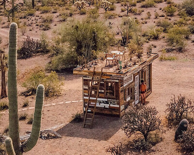 cabinland comes to the sunny southwest, beginning with its salvaged timber 'desert cabin'