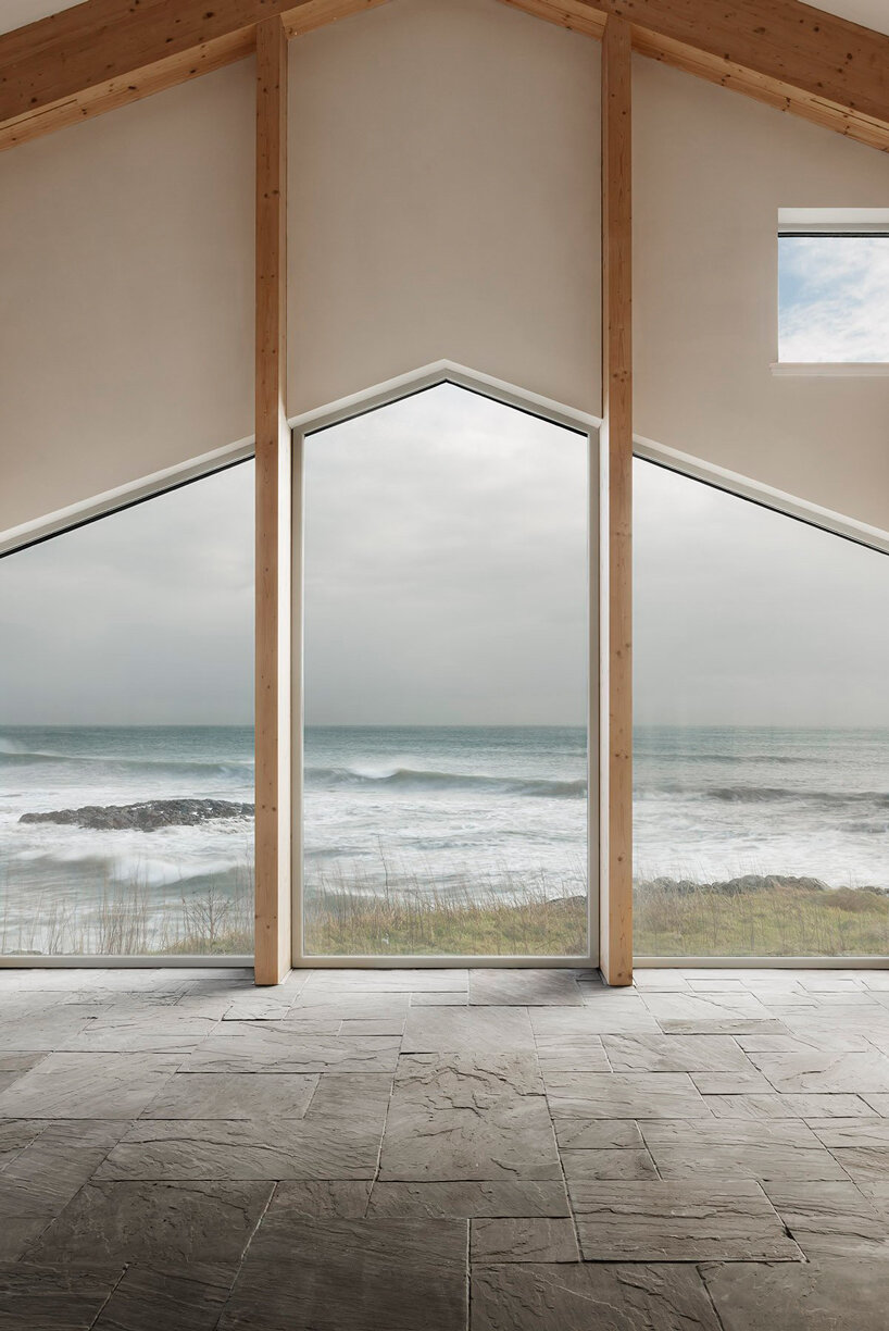 denizen works perches its luminous 'mannal house' atop the rocky coast of scotland