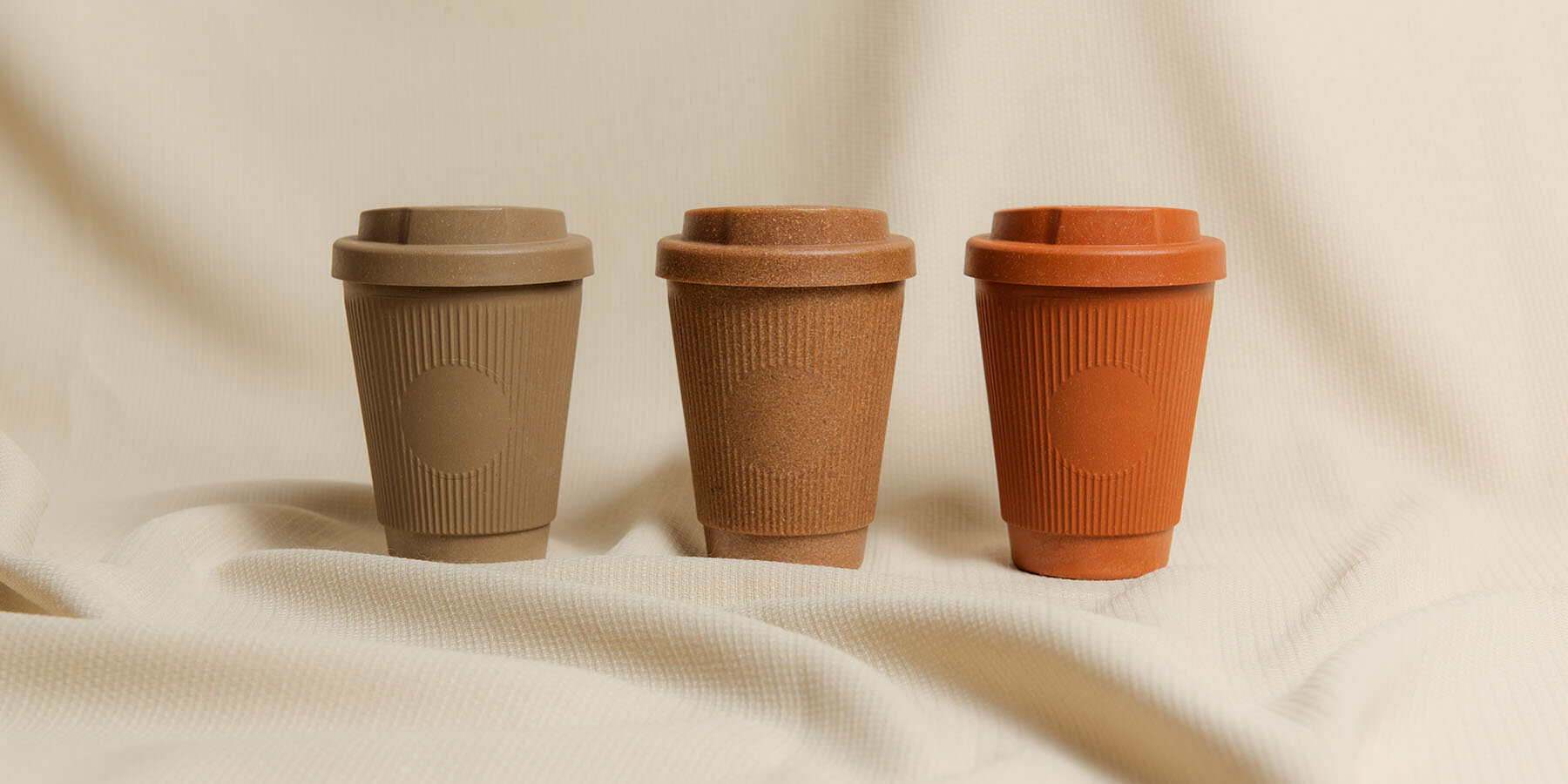 https://static.designboom.com/wp-content/uploads/2022/05/kaffeeform-launches-two-new-version-of-its-popular-travel-mug-weducer-cup-made-from-repurposed-waste-materials-2-627a5f7813c94.jpg