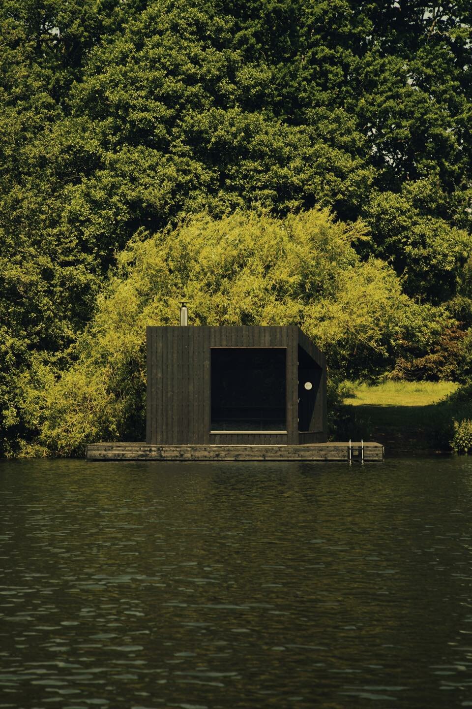 koto designs sustainable cabin retreat with floating sauna for fritton lake in england