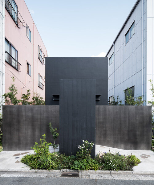 black tones unify this japanese temple's ossuary and tree burial facility by love architecture