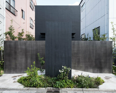 black tones unify this japanese temple's ossuary and tree burial facility by love architecture