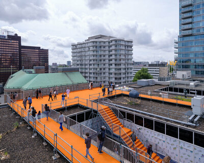 a bright orange rooftop walk designed by MVRDV opens in rotterdam