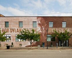 olson kundig weaves together the complex life and work of bob dylan in tulsa