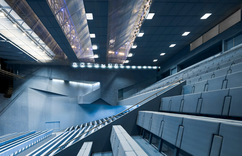 OMA completes taipei performing arts center with three 'plugged in' volumes