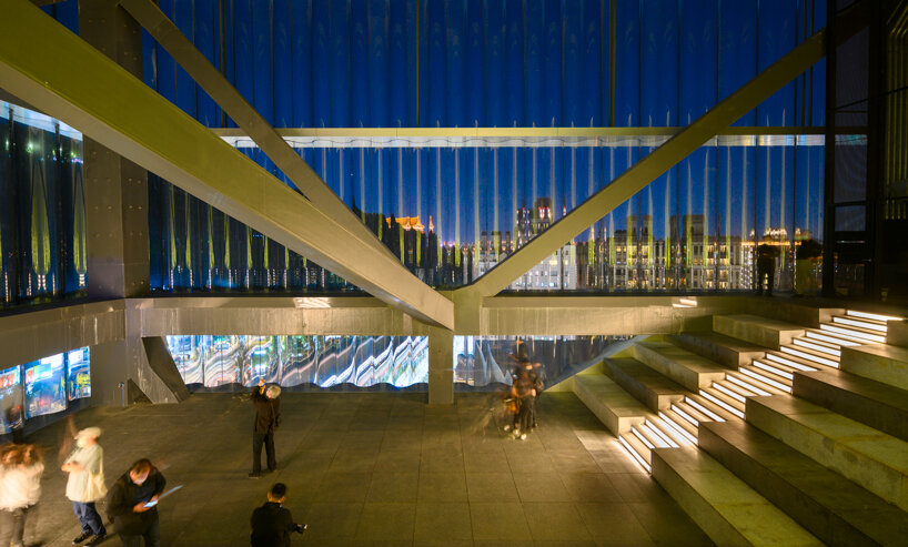 OMA completes taipei performing arts center with three 'plugged in' volumes