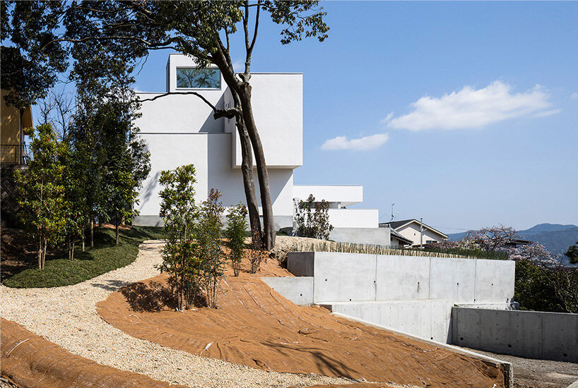 tranquil water basin casts rippling visuals within residence by FORM / kouichi kimura in japan