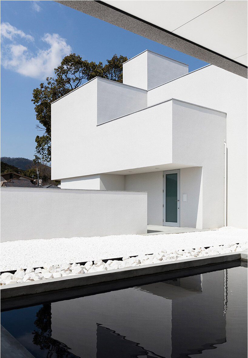 tranquil water basin casts rippling visuals within residence by FORM / kouichi kimura in japan