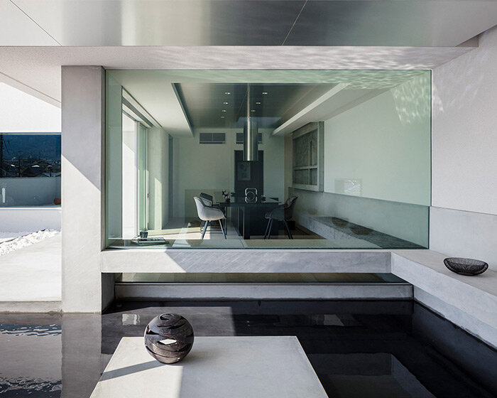 tranquil water basin casts rippling visuals within residence by FORM / kouichi kimura in japan