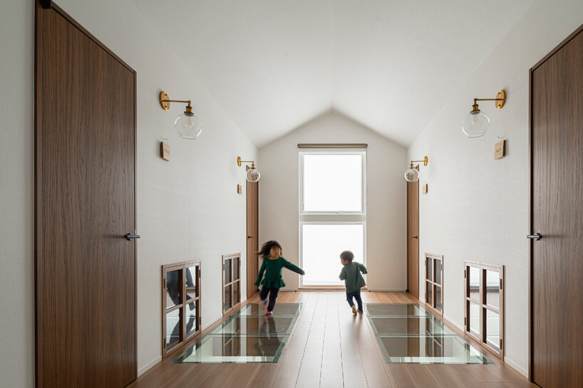 built around a common playroom, this japanese home celebrates sibling bonds