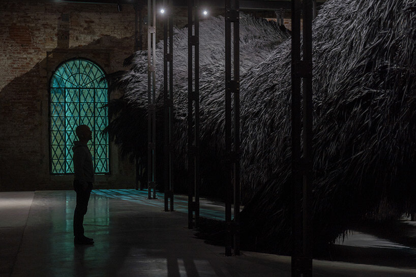 saudi arabia pavilion presents enigmatic 40-meter-long palm frond installation at venice art biennale