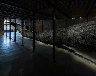 saudi arabia pavilion presents 40-meter-long palm frond installation at venice art biennale