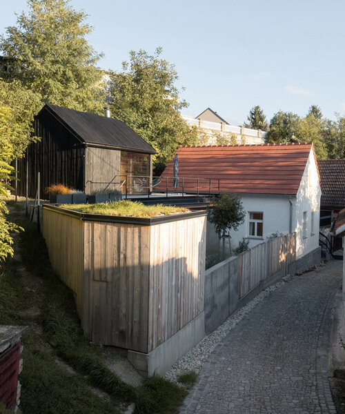 SENAA renovates a goat shed in czech village of bukovany into a contemporary weekend house