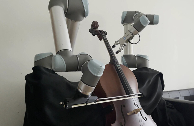 this dexterous two-armed robot plays multiple bowed instruments at the same time