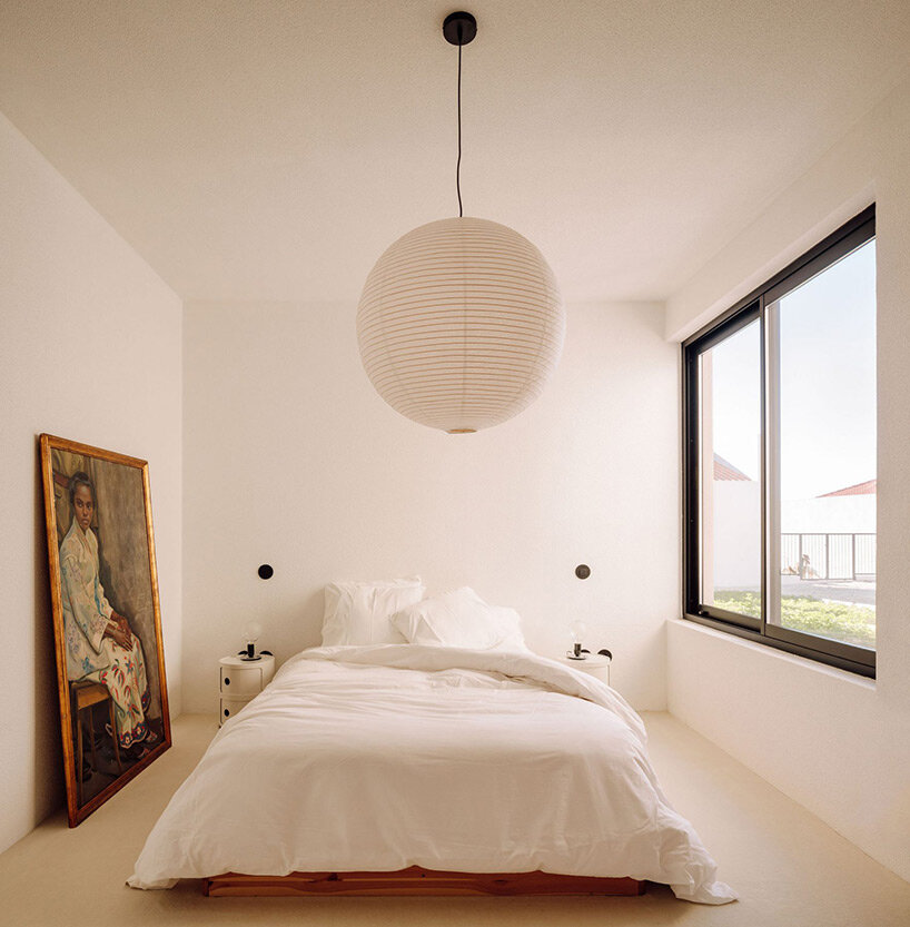 textured white & beige hues delineate boundaries within residential renovation in portugal