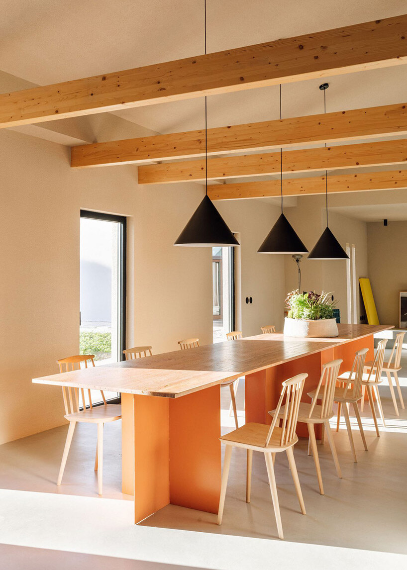 textured white & beige hues delineate boundaries within residential renovation in portugal