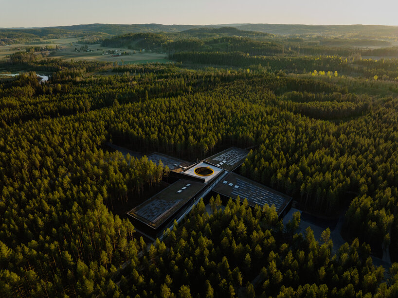 BIG's cross shaped factory in the norwegian woods gets ready for grand opening