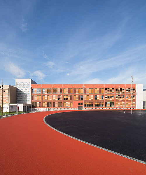 colorful brick cladding adorns school campus in france after sweeping makeover