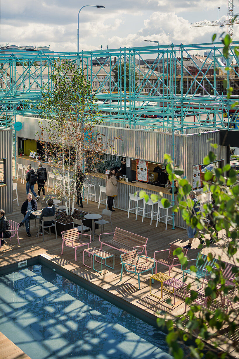 blue scaffolding characterizes CHYBIK + KRISTOF's manifesto andel in prague