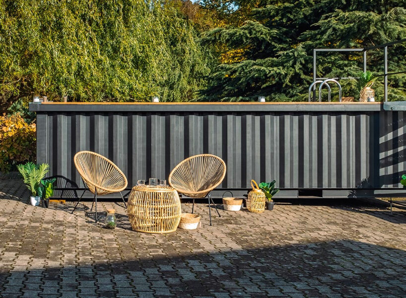 french company turns shipping containers into durable, low-maintenance swimming pools