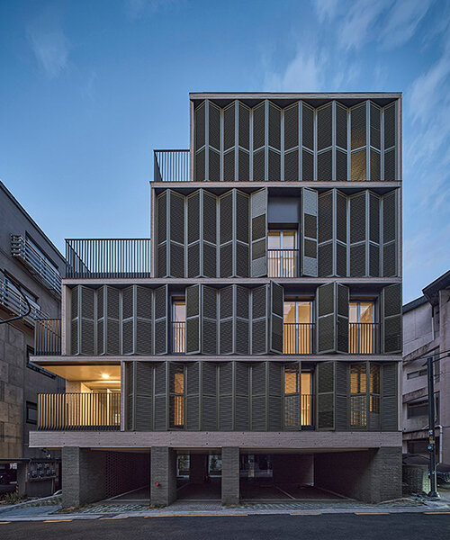 daniel valle architects' staggered villa stands out from restricted urban mass of seoul