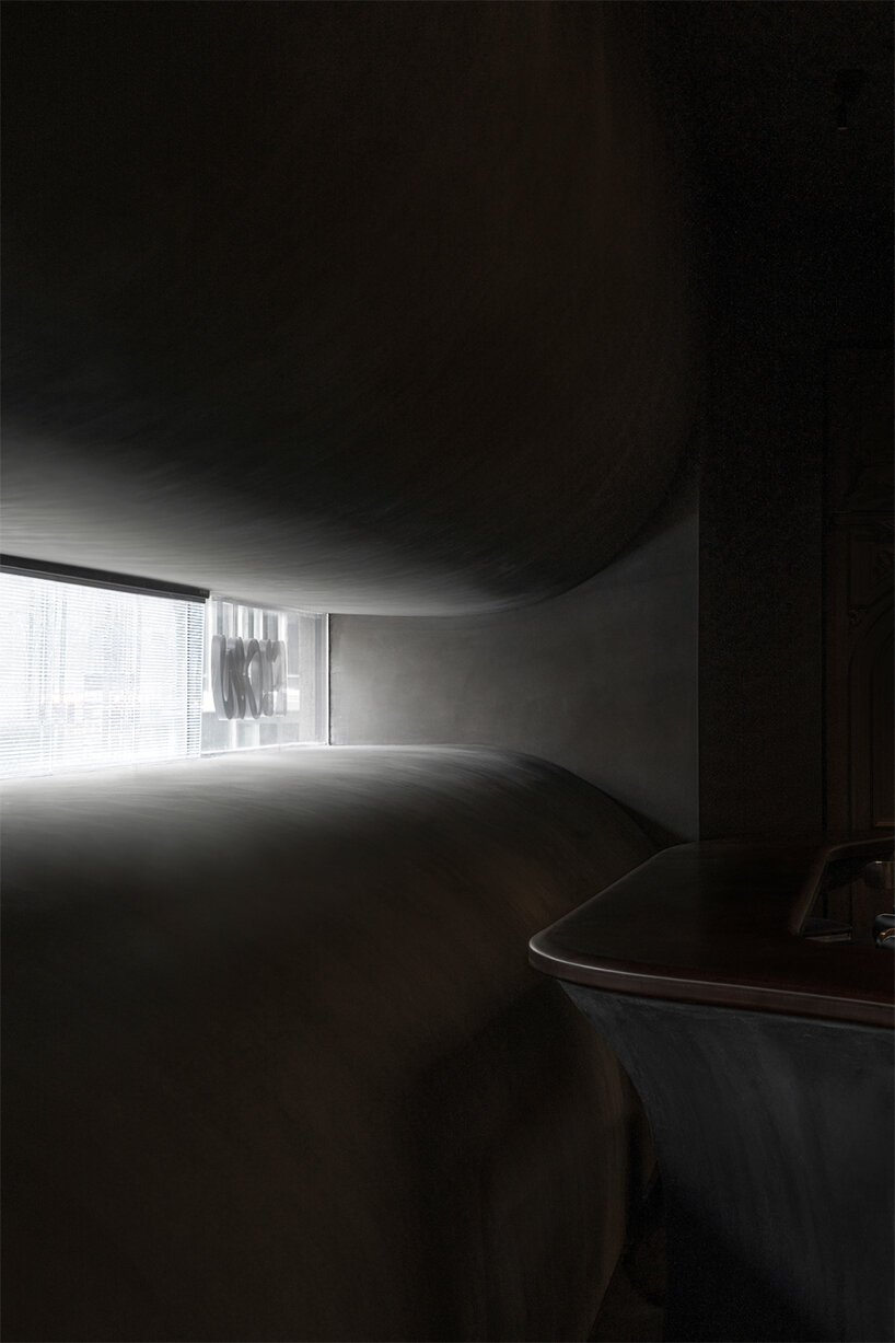 eye-catching waterdrop installation adorns the ‘flow bar & lab’ in china