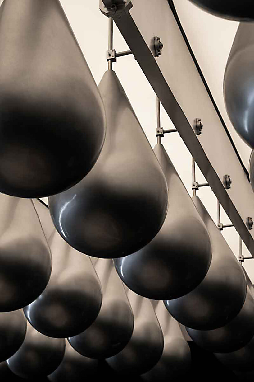 eye-catching waterdrop installation adorns the ‘flow bar & lab’ in china
