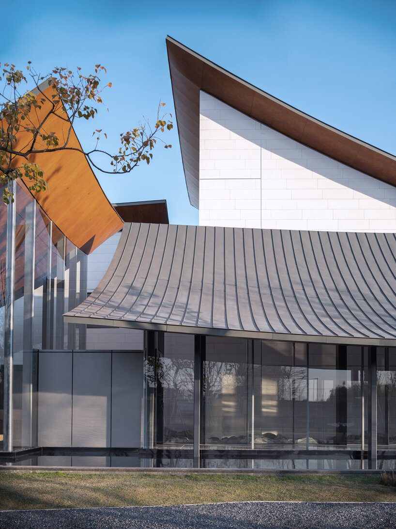 a series of hyperbolic shaped roofs tops GOA's jianli art center in china