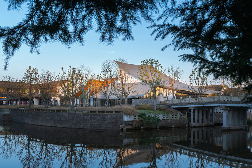 a series of hyperbolic shaped roofs tops GOA's jianli art center in china