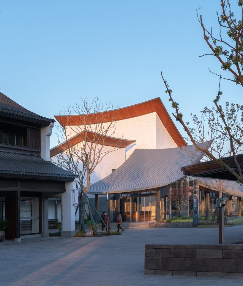 a series of hyperbolic shaped roofs tops GOA's jianli art center in china