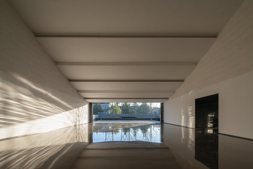 a series of hyperbolic shaped roofs tops GOA's jianli art center in china