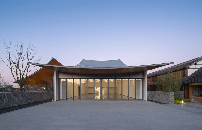 a series of hyperbolic shaped roofs tops GOA's jianli art center in china