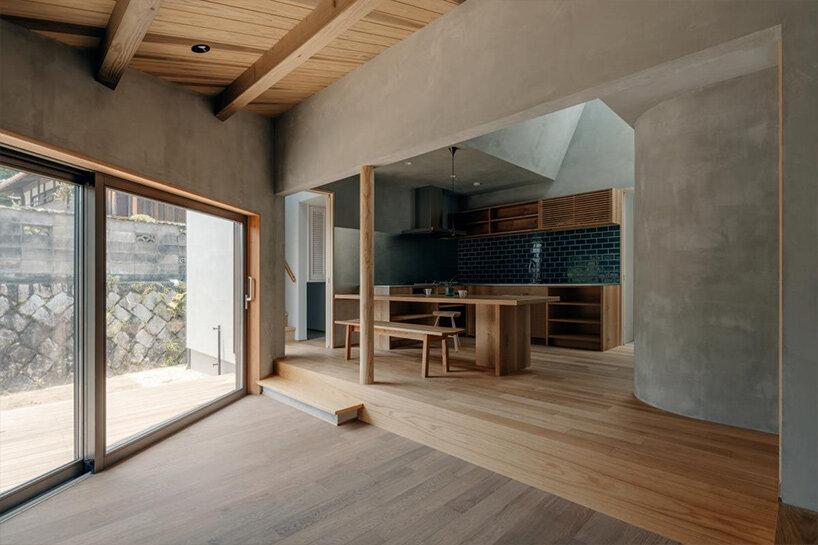 hearth architects blends concrete with timber touches within minimalistic house in japan