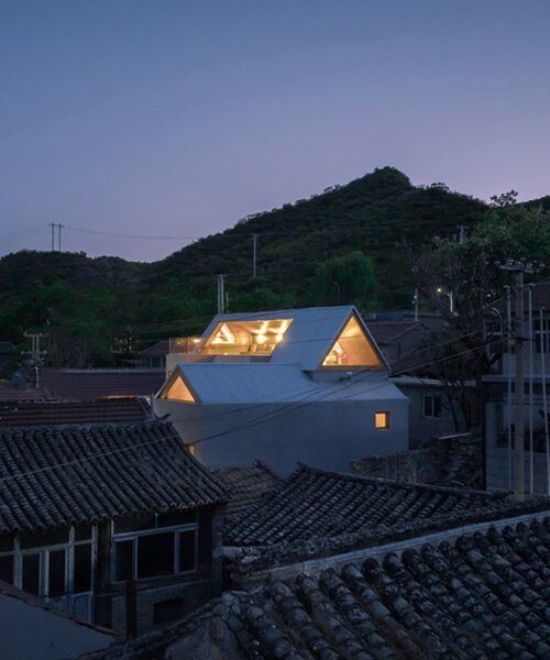 chaoffice stacks two pitched volumes atop vacation house in rural beijing
