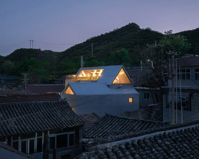 chaoffice stacks two pitched volumes atop vacation house in rural beijing